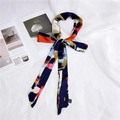 Close-up of a 100% silk scarf with abstract patterns tied in a bow on a white fabric - Oil Painting