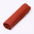 Rolled reddish-brown cotton linen scarf with visible woven texture on white background - 21# Rust Red