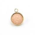Macro detail of a 12mm gold stainless steel resin pendant with pink starry texture - Skin Pink(14)