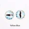 Macro detail of yellow and blue glass eye cabochons with realistic slit pupil iris - Yellow Blue