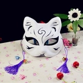 Japanese fox mask in white with black patterns, purple tassels, and small metal bells - Black A