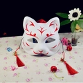 Japanese fox mask in white and red with hand-painted patterns, tassels and bells - Red M Style