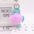 Detail of cute seahorse keychain with pink faux fur pompom and teal blue PU leather tail - Light Purple
