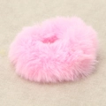 Soft pink plush scrunchie in faux rabbit fur with a fluffy texture for women's hair styling - Pink