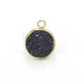 Macro detail of round gold stainless steel pendant with black sparkling resin inlay - Black (12)