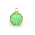 Macro shot of a round green resin pendant with a gold stainless steel frame and ring - Green(15)