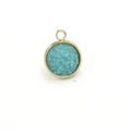 Macro detail of 12mm gold stainless steel charm with teal resin crystal inlay for jewelry - Lake Blue(28)