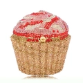 Detailed macro view of a pink and gold cupcake clutch bag with sparkling rhinestones - Red Colorful