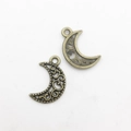 Antique bronze crescent moon charm with intricate hollow filigree for DIY jewelry making - Antique Bronze Hollow Moon (12x18mm)