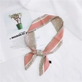 Polka dot and stripe silk scarf in pink and beige tied on a magazine and white fabric - 13 Stripe Polka Dot Grey