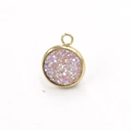 Macro view of a 10mm round pink glitter pendant with polished golden stainless steel frame - Pink Purple(24)
