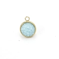 Macro detail of round light blue resin pendant with gold stainless steel frame - Light Blue(25)