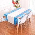 Detail of Christmas PVC tablecloth with Santa and reindeer patterns on a wooden dining table - Style 3 Santa Claus with Sign