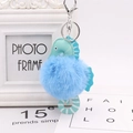 Simpatico portachiavi a pompon a forma di cavalluccio marino blu con morbida ecopelliccia - Blu