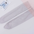 Sheer grey mesh socks with pink elastic cuffs presented on a clean background - One Size / Gray
