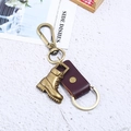Vintage bronze alloy boot keychain with leather strap and metal ring for men - Brown