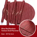 Sottopiatto ovale bordeaux in PVC con trama di bambù, termoresistente, 45x32,5 cm - Motivo In Bambù Color Bordeaux. / Forma Ovale 45*32 Cm Circa 70 G.