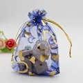 Blue organza drawstring bag with gold heart patterns for jewelry gift packaging - Sapphire Blue