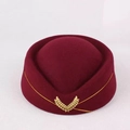 Dark red flight attendant hat with golden emblem and wool felt texture for performance - Burgundy
