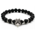 Men's natural black lava stone beaded bracelet featuring a silver dragon charm pendant - Lava Stone / Silver