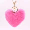 Detailed view of pink heart-shaped plush keychain with golden lobster clasp and ring - Rose Red / Silver Circular Single-ring Buckle