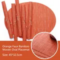 Oval orange bamboo-weave PVC placemat, heat-resistant and non-slip, size 45x32.5cm - Orange Yellow Bamboo Texture