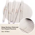 Beige fan-shaped PVC placemat with bamboo weave texture and rope detail 45x30cm - Creamy White Bamboo Texture