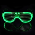 Neon green LED shutter glasses glowing on a reflective black surface for parties - Green