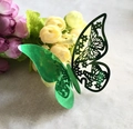 Detailed view of a green 3D hollow butterfly wall sticker with metallic reflective finish - Reflective Green
