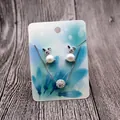 Detail of silver bunny jewelry set with pearls and rhinestones on display card - Green Feather Pattern (Earring Card) / 5x7cm