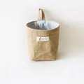 Nordic jute hanging storage pocket with blue striped lining and cat tag detail - Blue Stripe