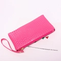 Fashionable bright pink PU leather clutch bag with embossed crocodile texture and wrist strap - Rose Red