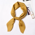 Elegant ginger yellow silk satin square scarf tied in a stylish neck knot on white background - 70x70cm / Autumn Green