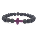 Macro shot of natural black volcanic lava beads featuring a purple cross charm bracelet - Purple Cross