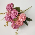 Detailed view of pink and orange silk hydrangea bouquet with green leaves and stems - Dusty Pink
