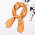 Orange golden satin neck scarf with a silky finish shown in a stylish knot style - 70x70cm / Yellow