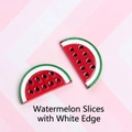 Macro detail of two resin watermelon slices with seeds for DIY jewelry making - White Edged Watermelon Slice