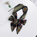 Long navy silk-style scarf with red floral prints tied as a bow for hair or bags - Vintage Navy Floral