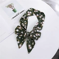 Dark green silk bow scarf featuring delicate white floral patterns on a round table - Dark Green Floral
