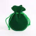 Dark green velvet drawstring jewelry pouch with smooth texture and round bottom - Green