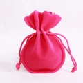 Hot pink velvet drawstring jewelry pouch with elegant wavy edges and soft texture - Rose Red