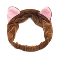 Close-up of soft brown plush cat ear headband with pink inner lining for face washing - Brown