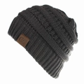 Dark charcoal cable knit ponytail beanie with C.C faux leather brand tag detail - Dark Gray
