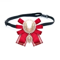 Elegant red satin bow brooch with large faux pearl and sparkling rhinestone trim - Red Ribbon Style