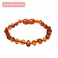 Irregular dark amber bracelet for babies made of natural Baltic fire amber beads - Fire Amber Baby Bracelet
