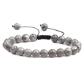 Detail of grey and white snowflake stone beads with black woven adjustable bracelet cord - Map Stone
