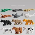 Detail showing 12 different animal building block models including tigers and sharks - 12 Pcs Full Animal Set