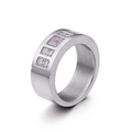 Titanium steel ring featuring square pink gemstone with vertical side diamond accents - Pink