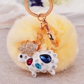 Yellow faux fur pompom keychain with a rhinestone-studded sheep charm in rose gold - White Lamb + Beige Pom Pom