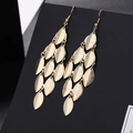 Elegant gold-tone layered leaf tassel drop earrings with a high-shine metallic finish - H4556 Leaf Layered Tassel